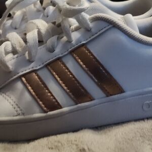 Adidas White Sneakers with Bronze Stripes